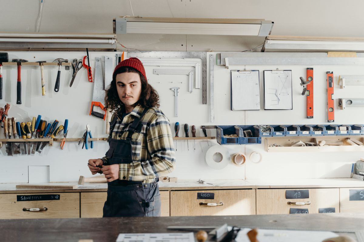 Carpenter at work in a wood workshop