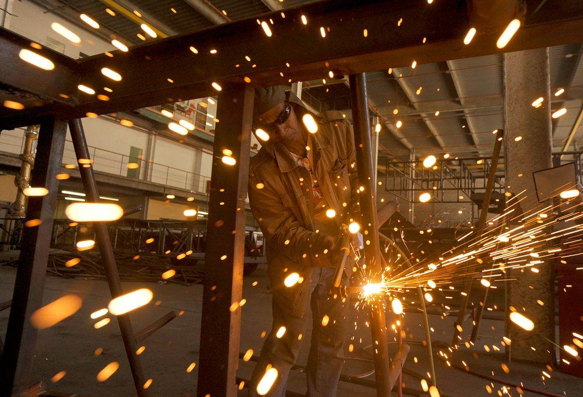 Welder with flying sparks